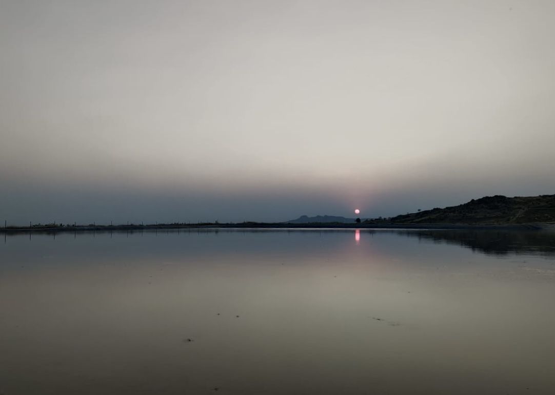 Sunset mirrored in the pond