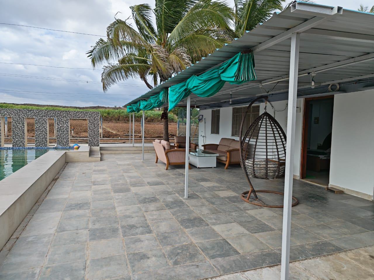 Poolside veranda swing