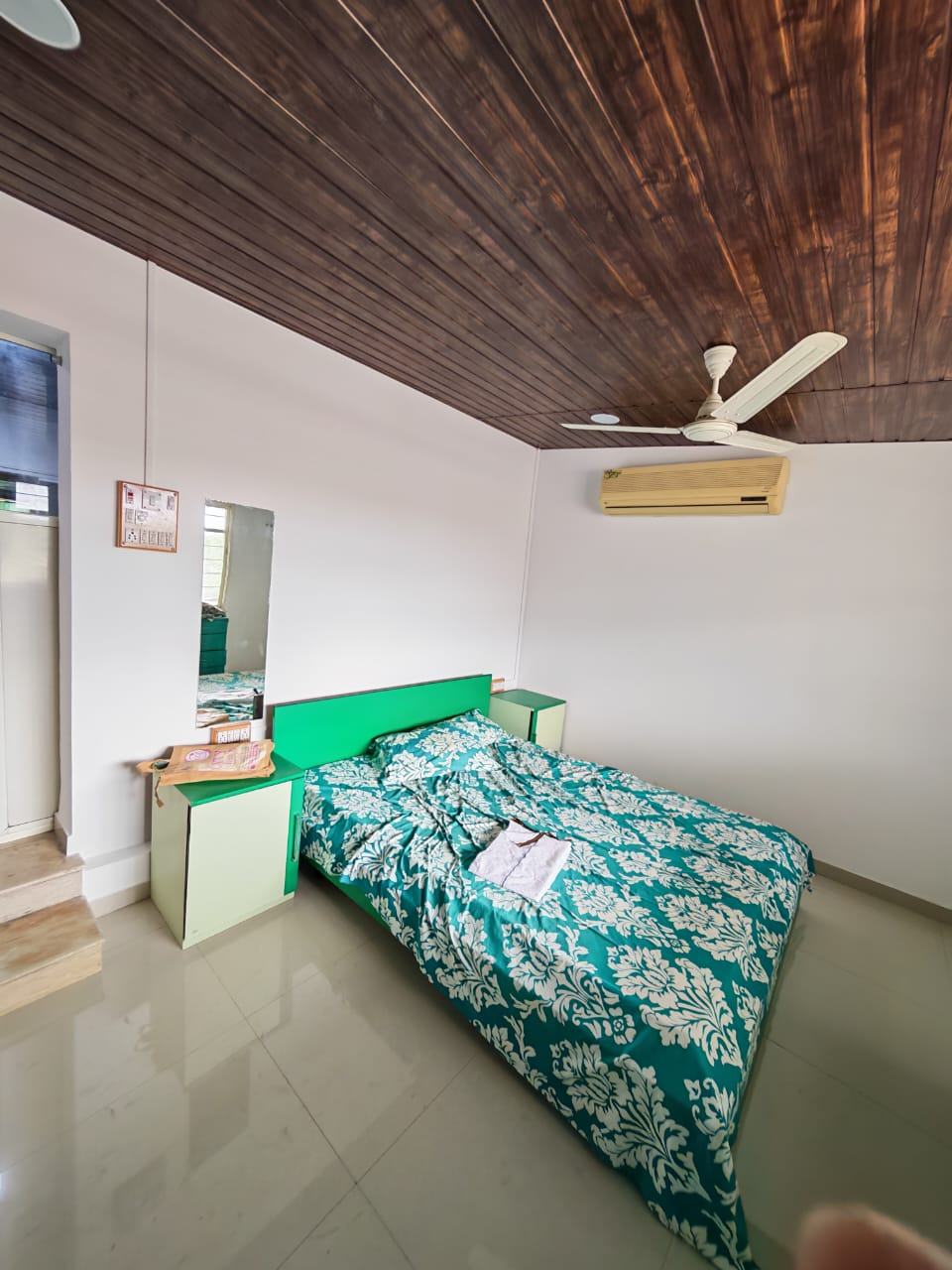 Bedroom green bed
