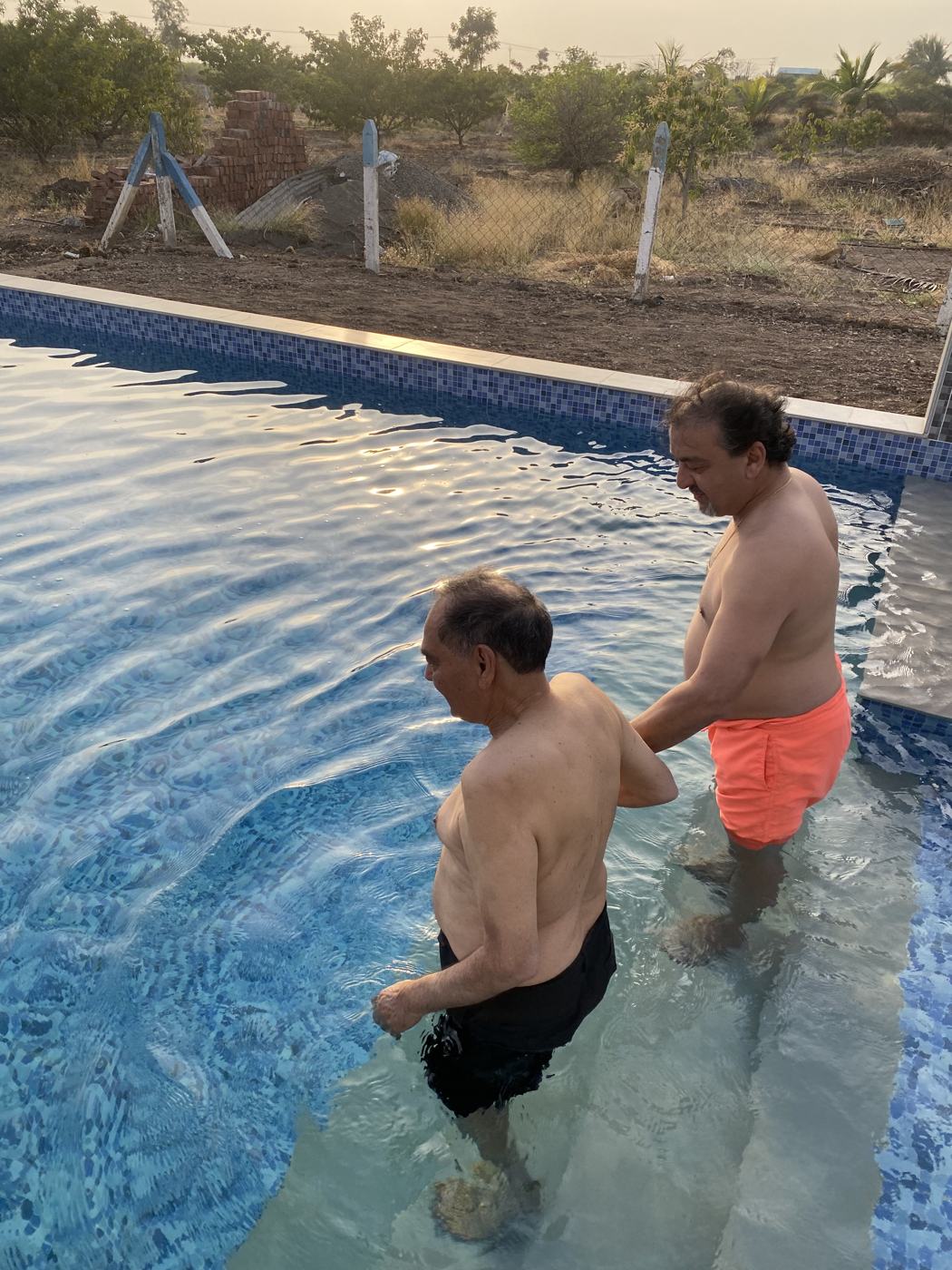 Pool two men steps
