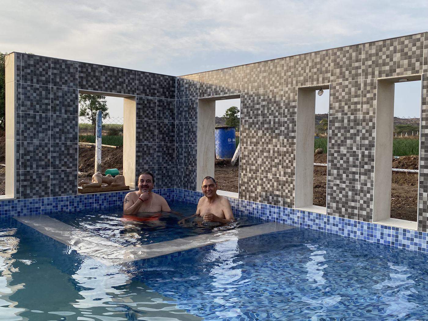 Pool two men wall