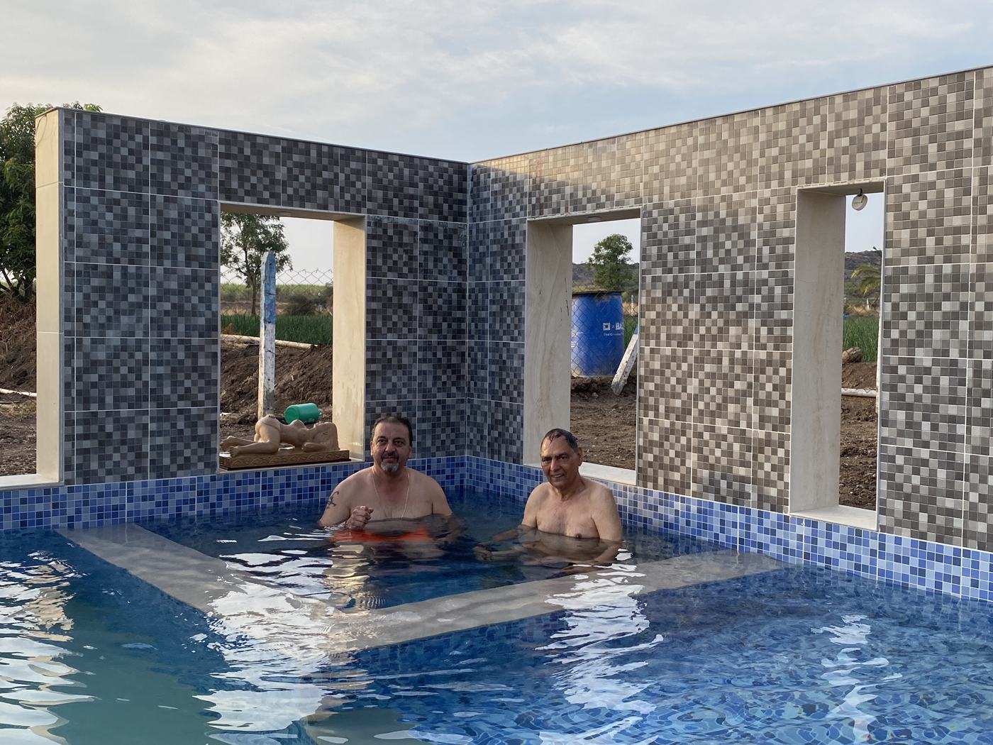 Pool two men wall