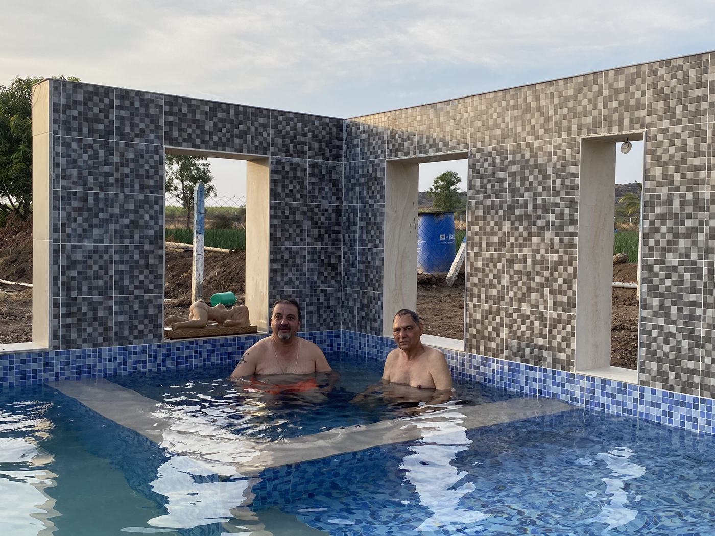 Pool two men wall