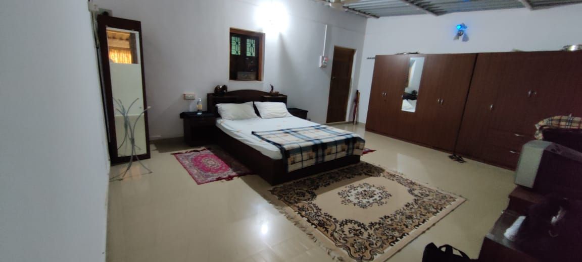 Large bedroom with wardrobes